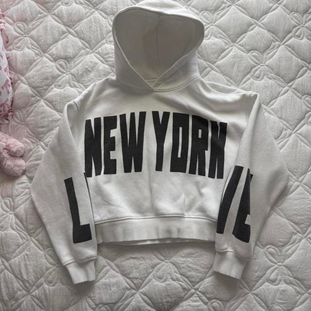 white and black New York Zara hoodie